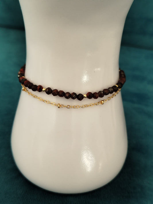 Bracelet doré et perles oeil de faucon